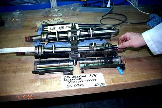 Right outboard aileron actuator - cylinder rods - secondary position