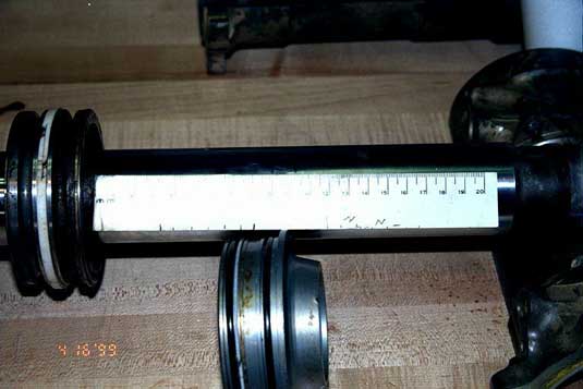 Left inboard aileron actuator - cylinder rod score marks