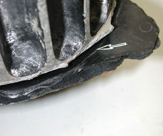 Recovered fan - Exhibit 1-8212 - impeller gouge close-up