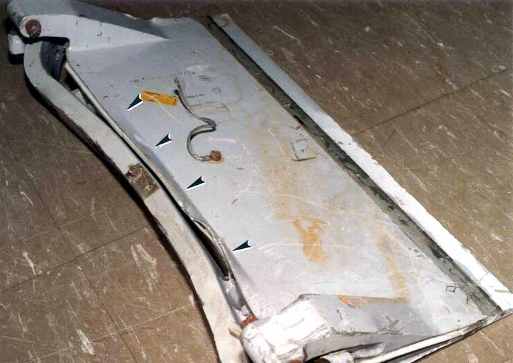 Trappe avant déformée vers l'intérieur